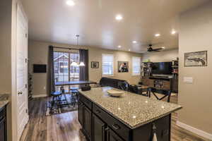 Kitchen view of great room, sliding doors to the back yard