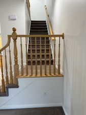 Stairs featuring baseboards
