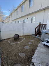 View of yard featuring fence