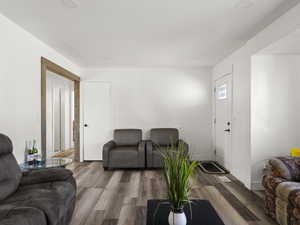 Living area with wood finished floors