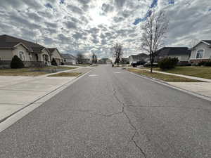 View of road with a residential view and sidewalks