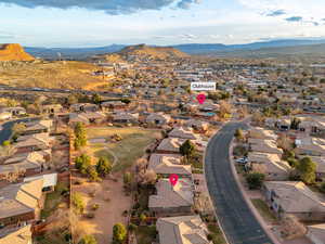 Drone / aerial view with a mountain view and a residential view