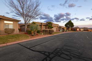 Exterior space featuring a residential view and stucco siding