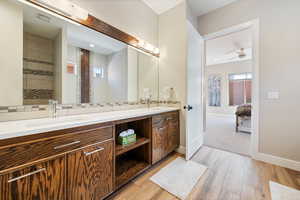 Full bathroom featuring double vanity