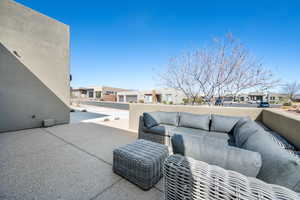 View of patio with a residential view and an outdoor area