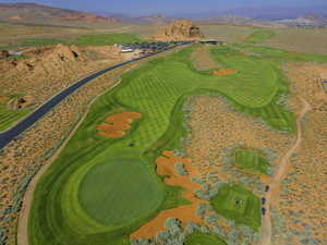 Bird's eye view with view of golf course and a mountain view