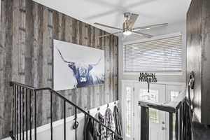 Entryway featuring a ceiling fan