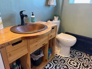 Bathroom with toilet and vanity