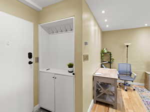 This appears to be a cabinet, but it's a hidden storage closet behind!