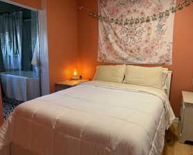 Bedroom featuring wood finished floors