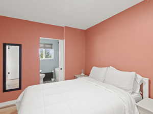 Bedroom featuring ensuite bathroom