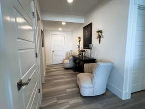 Interior space with recessed lighting, baseboards, and wood finished floors