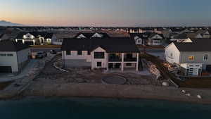 Aerial view at dusk with a residential view