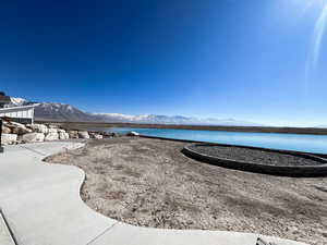 View of water feature with a mountain view