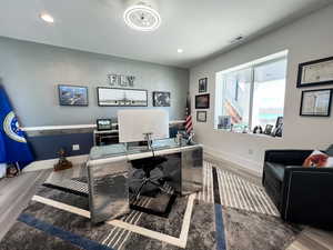 Office space featuring LVP floors, and recessed lighting