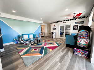 Game room featuring a ceiling fan, baseboards, LVP floors, and recessed lighting