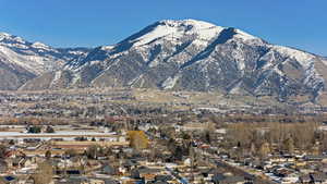 Property view of mountains featuring a residential view