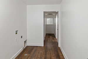 Laundry room featuring dark wood-style floors, baseboards, hookup for a washing machine, and hookup for an electric dryer