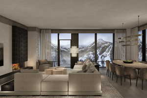 Living area with a mountain view and wood finished floors