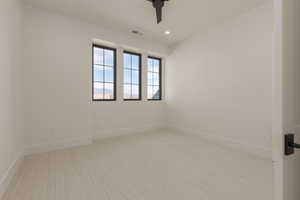 Unfurnished room with recessed lighting, carpet, visible vents, and baseboards