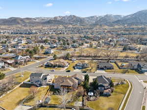 Drone / aerial view featuring a residential view and a mountain view