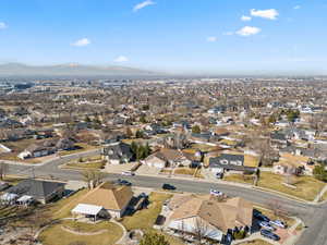 Drone / aerial view featuring a mountain view and a residential view