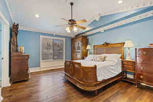 Bedroom featuring ceiling fan, recessed lighting, baseboards, vaulted ceiling, and hardwood / wood floors