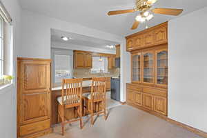 Dining space featuring ceiling fan