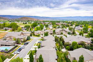 Aerial view featuring a residential view and a mountain view