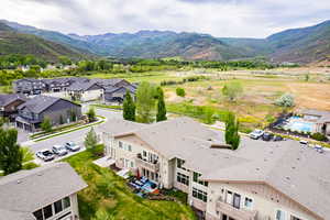 Aerial view featuring a residential view and a mountain view