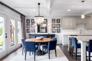 Dining room with dark wood-style floors, recessed lighting, beam ceiling, and coffered ceiling