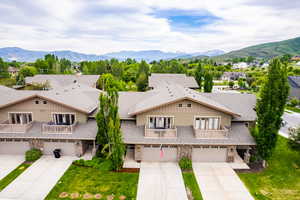 Drone / aerial view featuring a residential view and a mountain view
