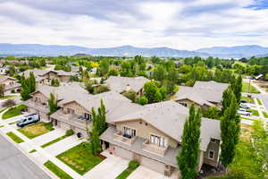 Drone / aerial view featuring a mountain view and a residential view