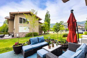 View of patio featuring outdoor lounge area and a mountain view