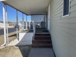 Wooden deck with a carport