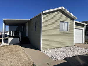 View of home's exterior featuring an attached garage