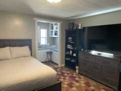 Bedroom with tile patterned floors