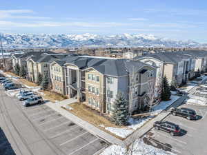 Aerial view featuring a mountain view and a residential view