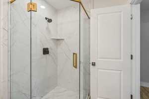 Bathroom featuring an enclosed shower