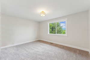 View of carpeted empty room