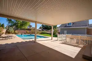 View of swimming pool with a patio, a fenced backyard, and a fenced in pool