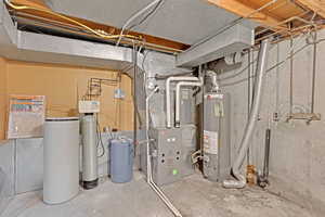 Utility room with heating unit and gas water heater