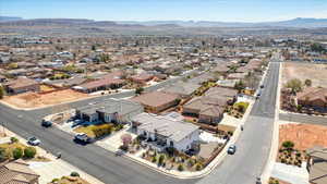 Drone / aerial view with a residential view and a mountain view