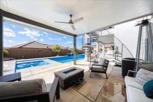 View of pool with a patio, cooling unit, a fenced backyard, and a fenced in pool