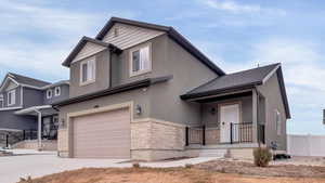 View of front of house featuring a garage