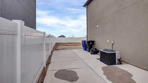 View of patio / terrace featuring central AC unit