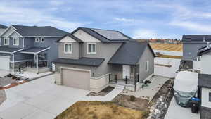 View of front facade with a garage