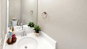 Bathroom featuring sink and toilet