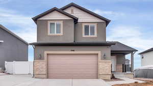 View of front facade with a garage