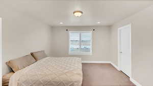 View of carpeted bedroom